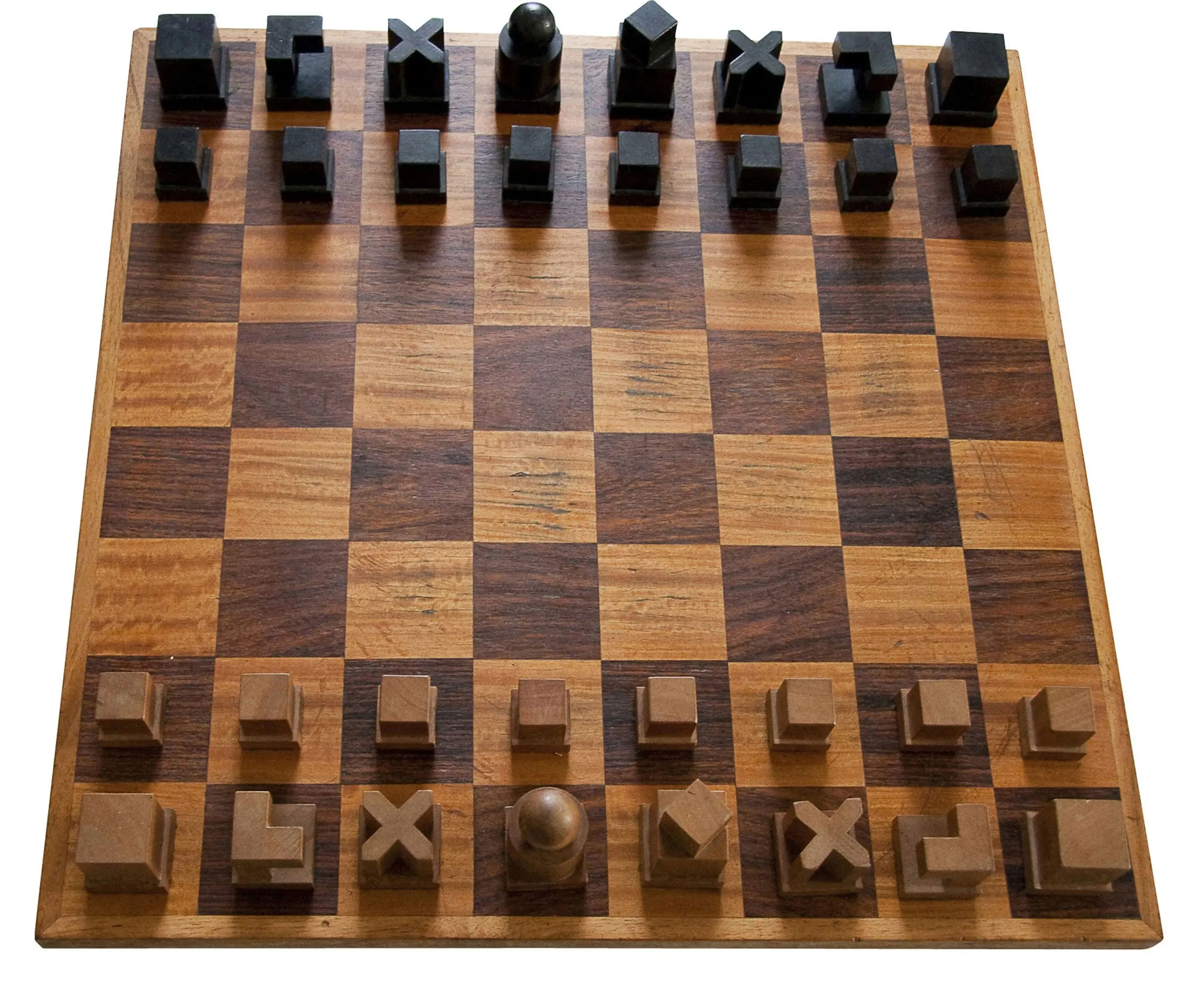 Close view of Josef Hartwig's Bauhaus chess pieces, showing the cube, cylinder and sphere vocabulary
